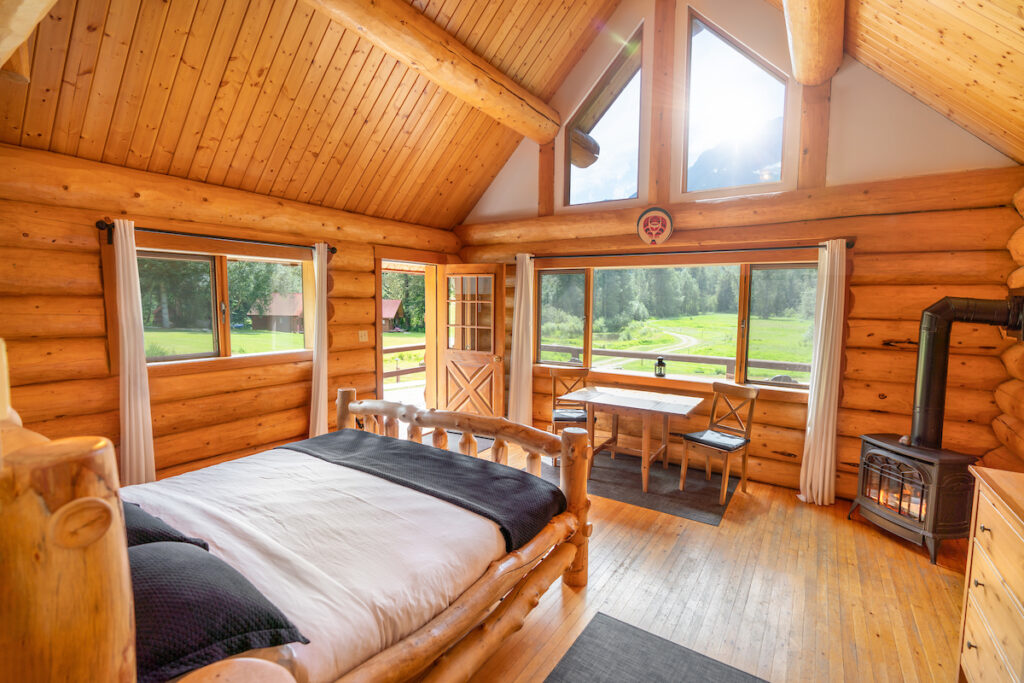 Log cabin room at Tweedsmuir Park Lodge with view of the property.